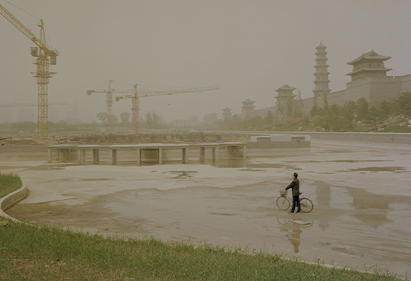 Cranes tower above a construction site near Datong’s walled city, a historic site and tourist attraction in northern Shanxi province. In recent years, Datong has been trying to develop a tourism industry as an alternative to coal mining.