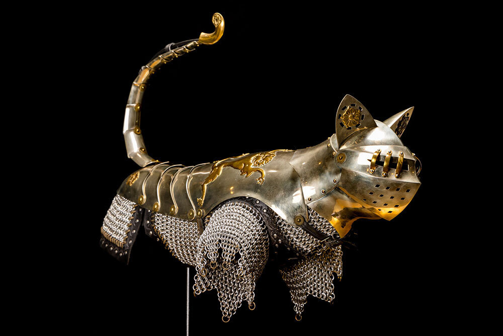 A picture of a suit of armor for a cat