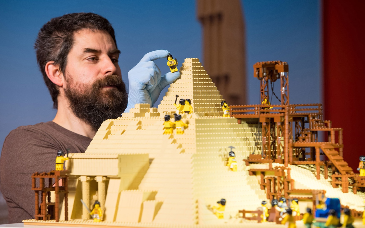 Adult fans of Legos like Phil Sofer, here building a model of the Great Pyramid of Giza, have played a major role in the toymaker's rise to the top of the industry. But insiders say the road from “kids only” to “adults welcome” was a long, uphill climb.