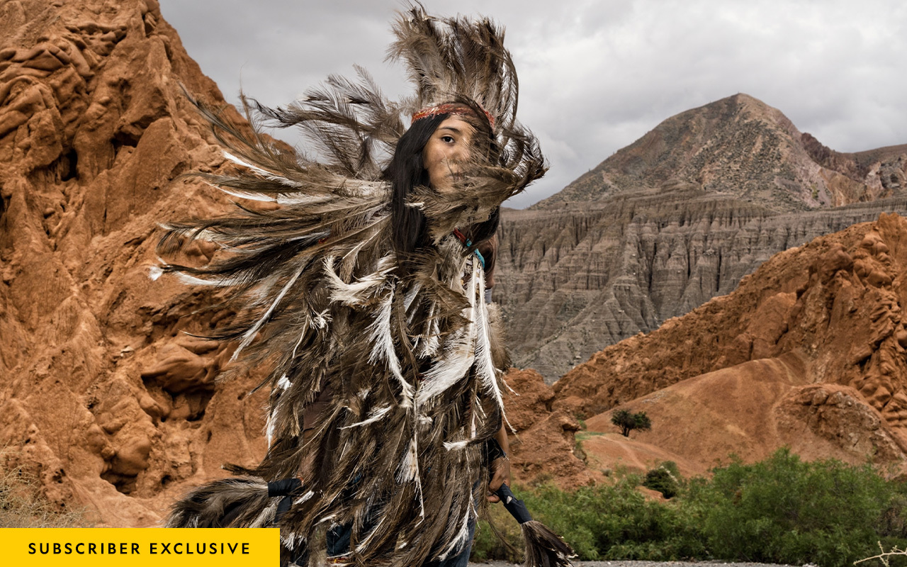 The Suris, also known as Samilantes, are a cultural group within the Quenchua community. This woman is Belén Cruz. Her feathered costume represents the nandu, or rhea, sacred bird of the Suris.