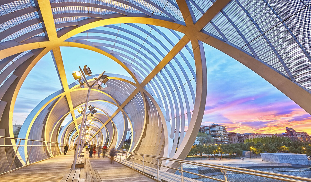 The Arganzuela Footbridge in Madrid, Spain, was designed by architect Dominique Perrault.