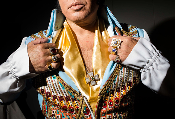 Mario Kombou, an Elvis tribute artist from London, England prepares to perform at the Daisy Theater during the Images of the King showcase during Elvis Week in Memphis, Tennessee.