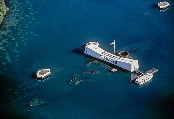 An aerial view of the World War II Valor in the Pacific National Monument reveals an outline of the sunken U.S.S. Arizona. The surprise attack on December 7, 1941, killed 1,177 of the ship's officers and men.