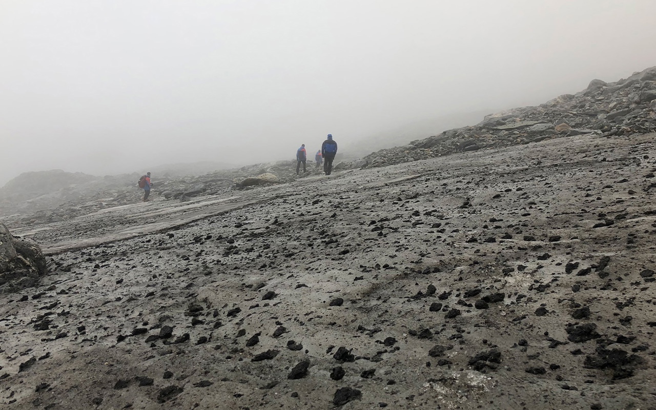 The Lendbreen ice patch in Norway, pictured here in 2019, is melting, revealing horse dung left by travelers who crossed the area centuries ago.