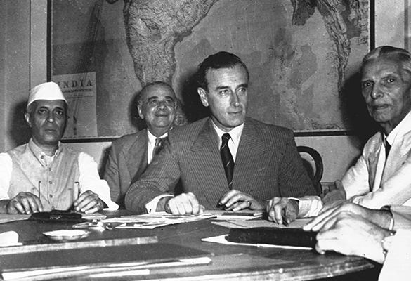 From left, Pandit Jawarharlal Nehru, vice president of India's interim government; Earl Mountbatten, viceroy of India; and Muhammad Ali Jinnah, president of the Muslim League, discuss Britain's plan for the future of its colony at the historic India Conference in New Delhi, June 2, 1947.