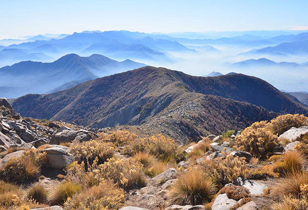 Santiago, Chile, sits in a valley surrounded by mountains.