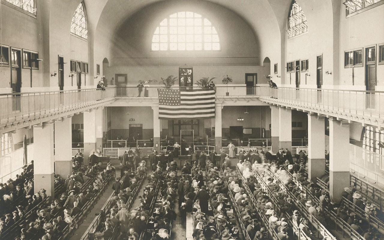 In the main hall of the immigration station on Ellis Island, immigrants wait for the next phase of inspection. On some days, more than 5,000 people filled this room.