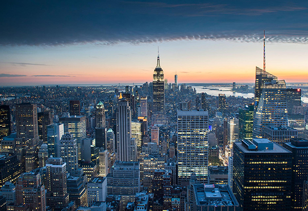 The sun sets over the Empire State Building.