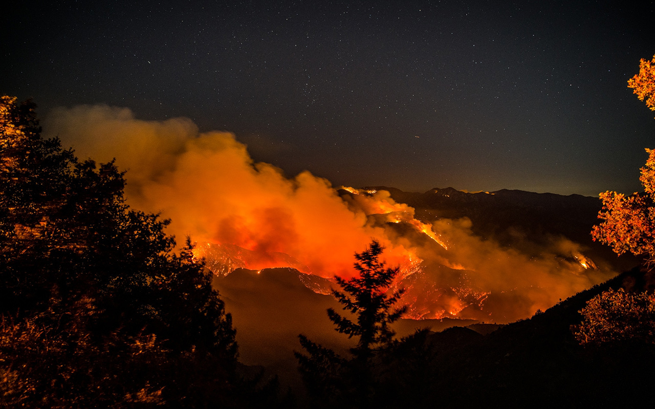 The Angeles National Forest, in Southern California, is engulfed in smoke and flames during last year’s record-breaking wildfire season. The Bobcat Fire, as this one was called, burned more than 115,000 acres. It was one of scores that blew smoke pollution across the western states and beyond—visible as far away as Washington, D.C.