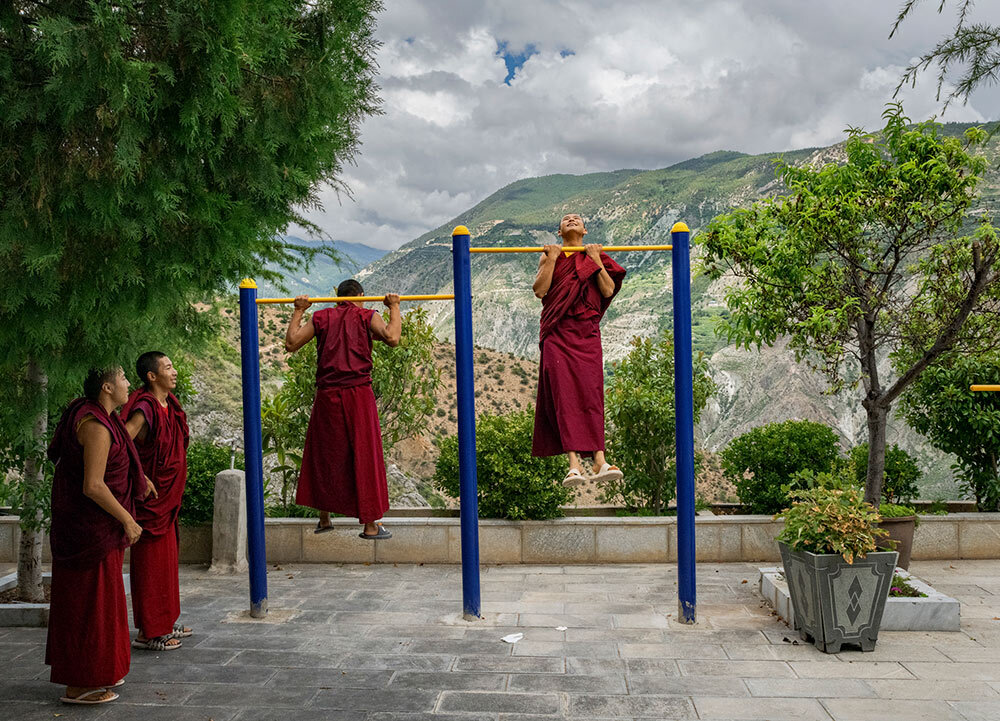 Buddhist monks do pull-ups