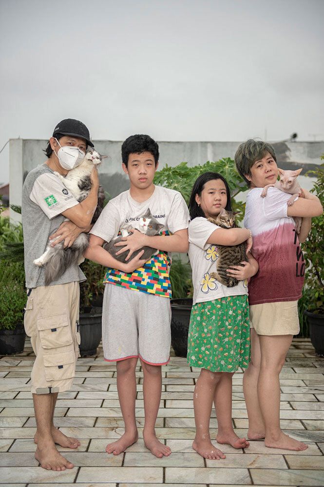 A family with their cats