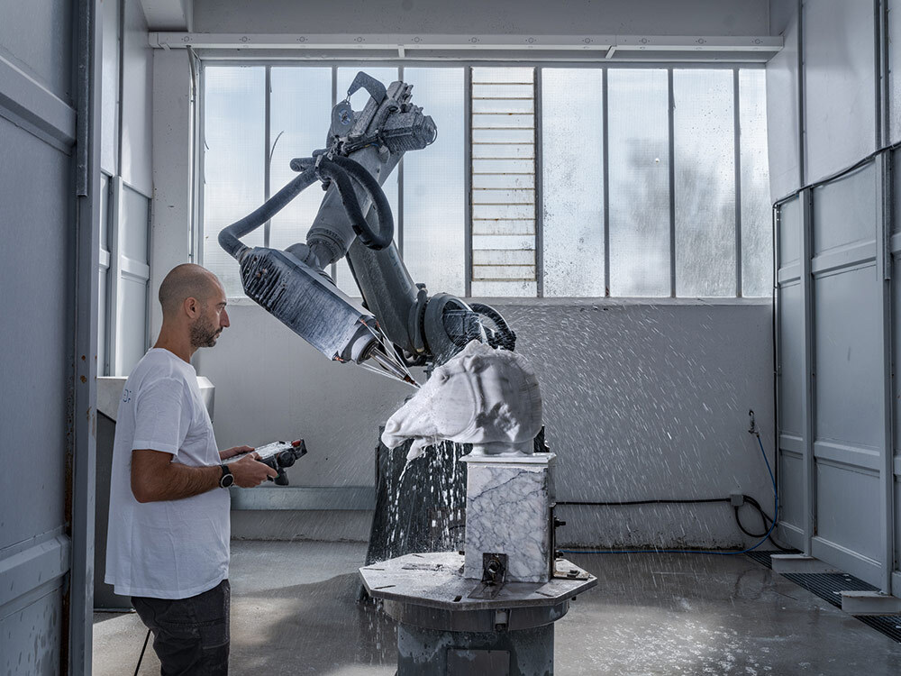 Federico Agostinelli monitors work on a horse head at a facility in Carrara, Italy.