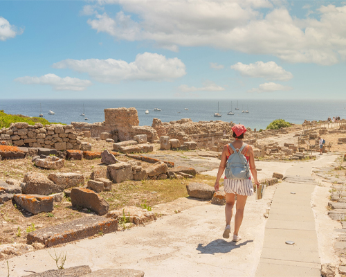 The Phoenician city of Tharros is home to ancient ruins, which include monuments, temples, tombs, and necropolises—evidence of the ancient Nuragic civilization that inhabited Sardinia during the Bronze Age. It’s just one of several not-to-be-missed experiences in Sardinia, Italy.