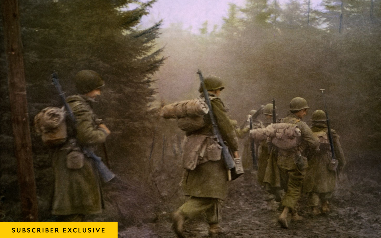 Members of an American airborne division move through the Ardennes Forest during the Battle of the Bulge, January 20, 1945.