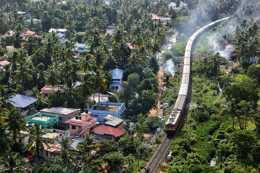 A passenger train travels through a city