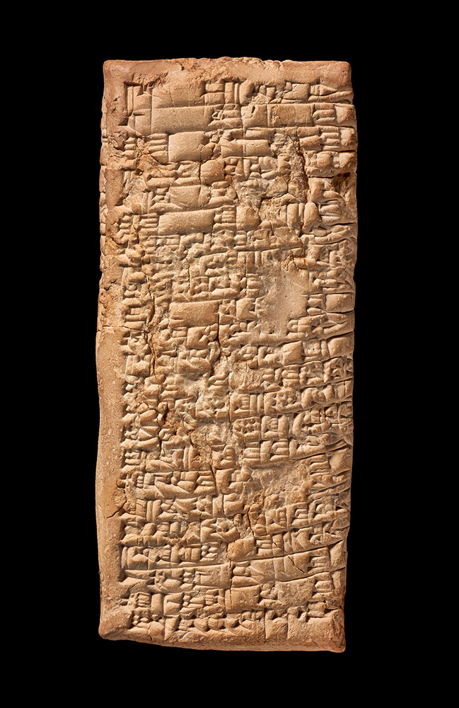 A stone tablet on a black background