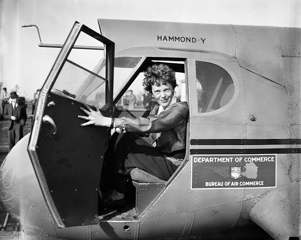 A picture of Amelia Earhart in a plane