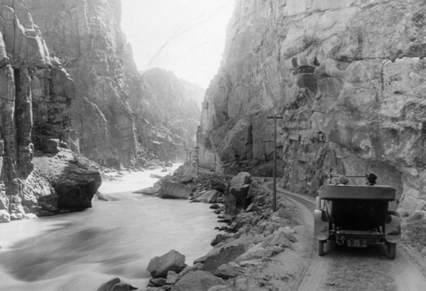 Visitors drive through Shoshone Canyon in Yellowstone National Park. America’s—and the world’s—first national park, Yellowstone attracts three million visitors a year today.