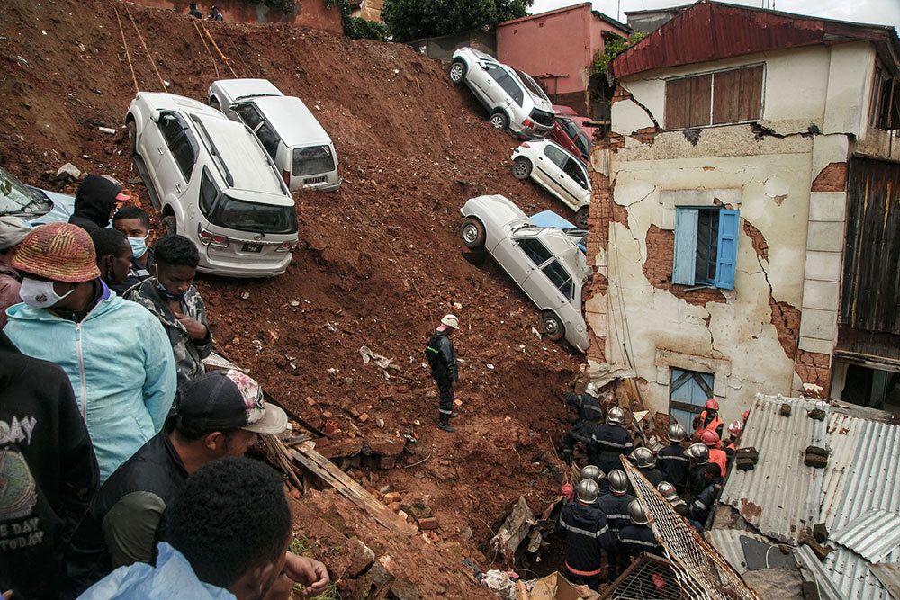 Cars and tons of mud crashed into a house during a landslide