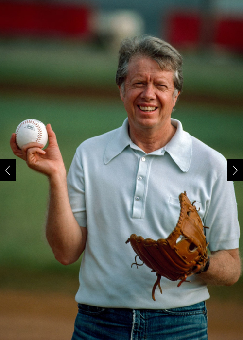 Jimmy Carter, not yet president, takes on the press in a baseball game during a break from the campaign trail in August 1976. The score is lost to history.