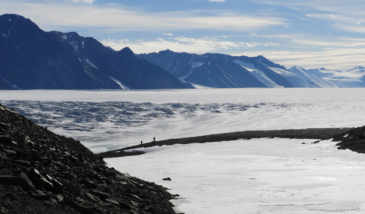 Two members of the soil research team head out to collect samples from one of the sites in the Shackleton Glacier region.