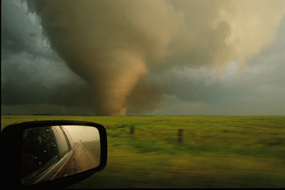 A massive F4 category tornado rampages through a field in North Dakota