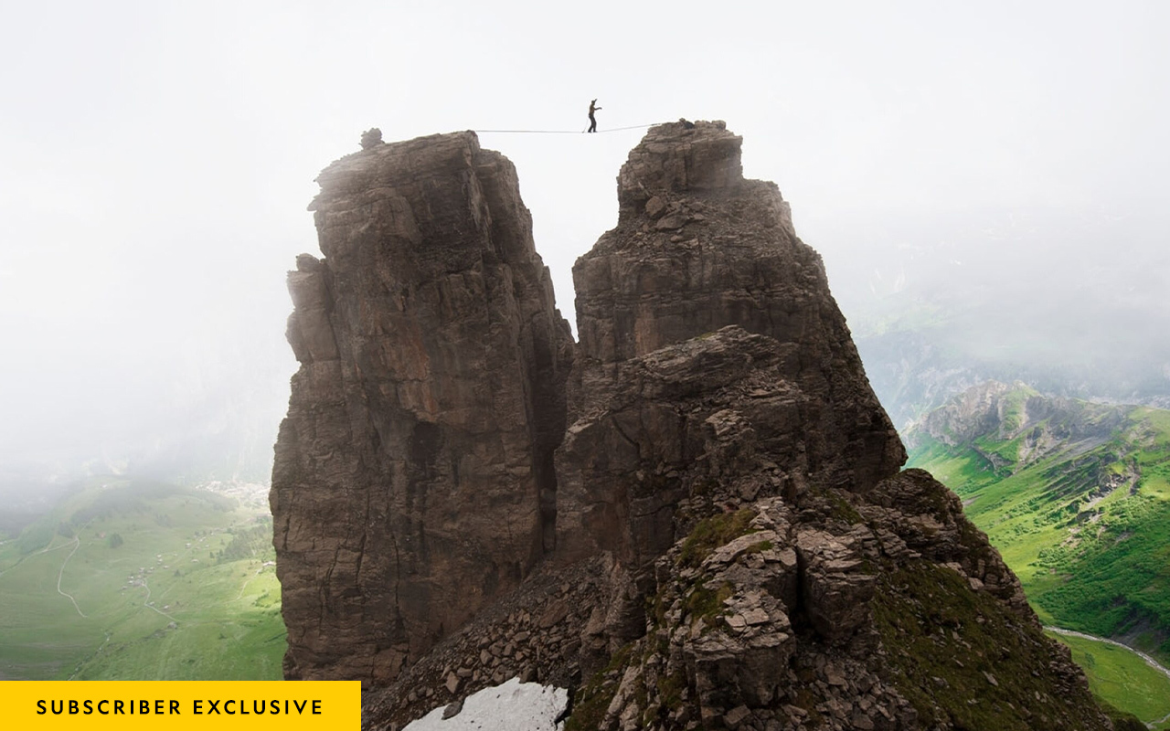 With only a rope to stand on, this daring mountain climber walked between rock formations in Switzerland.