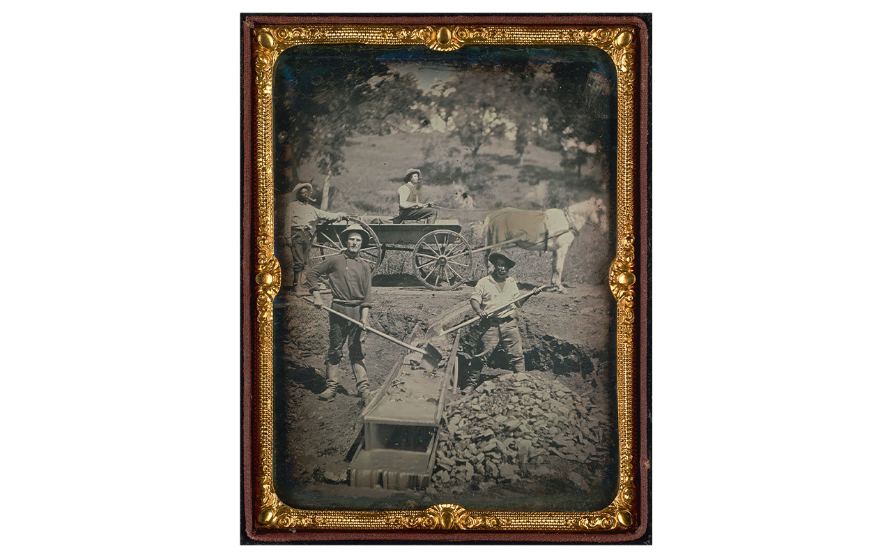 Miners pan for gold in 1852 at Spanish Flat in El Dorado County, California.