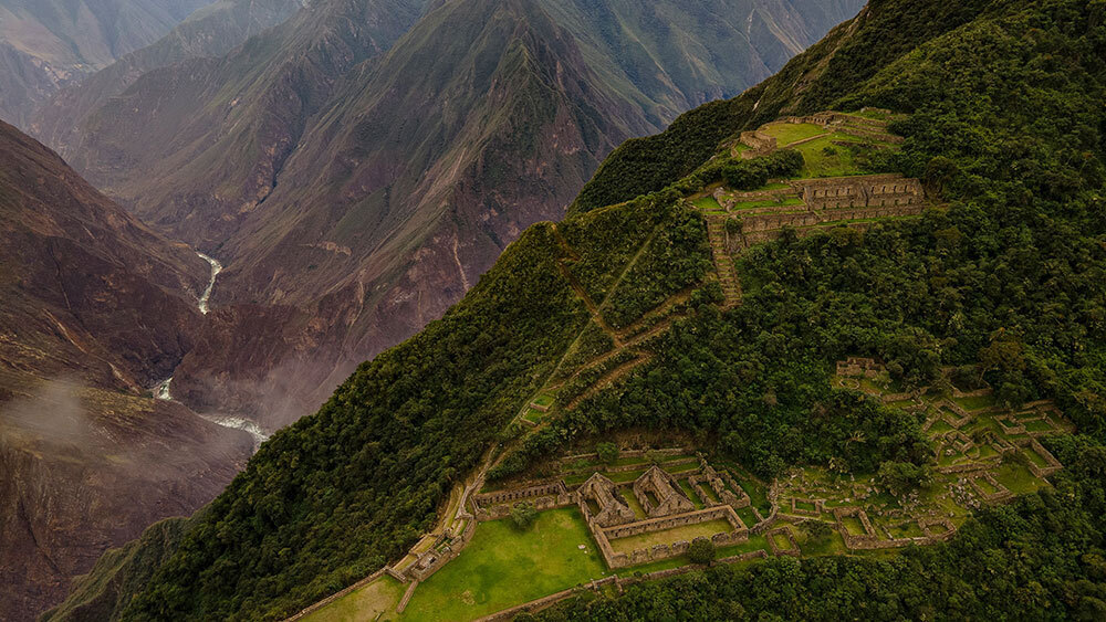 An aerial photograph of ruins on a mountain ridge