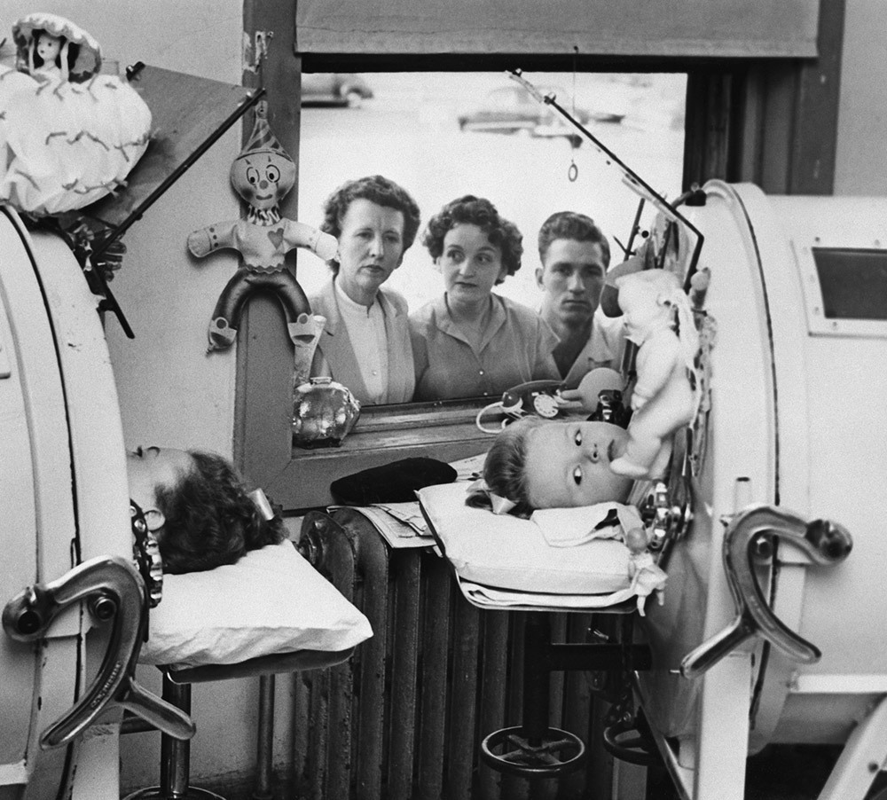 Two children rest in iron lungs