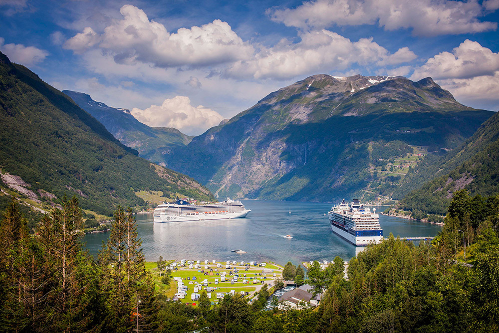 An elevated view of Geiranger and Geiranger fjord.