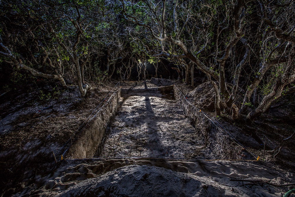 An excavations site in a Native American town on Hatteras Island at night