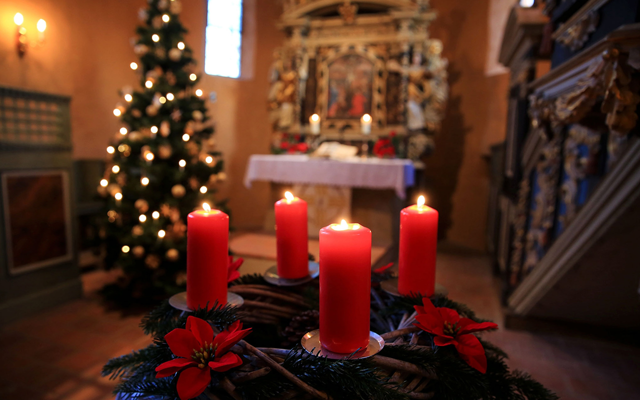 Candlelight Advent wreaths like this one inside the Sankt-Petri church in Magdeburg, Germany—signify light in the dark days of winter.