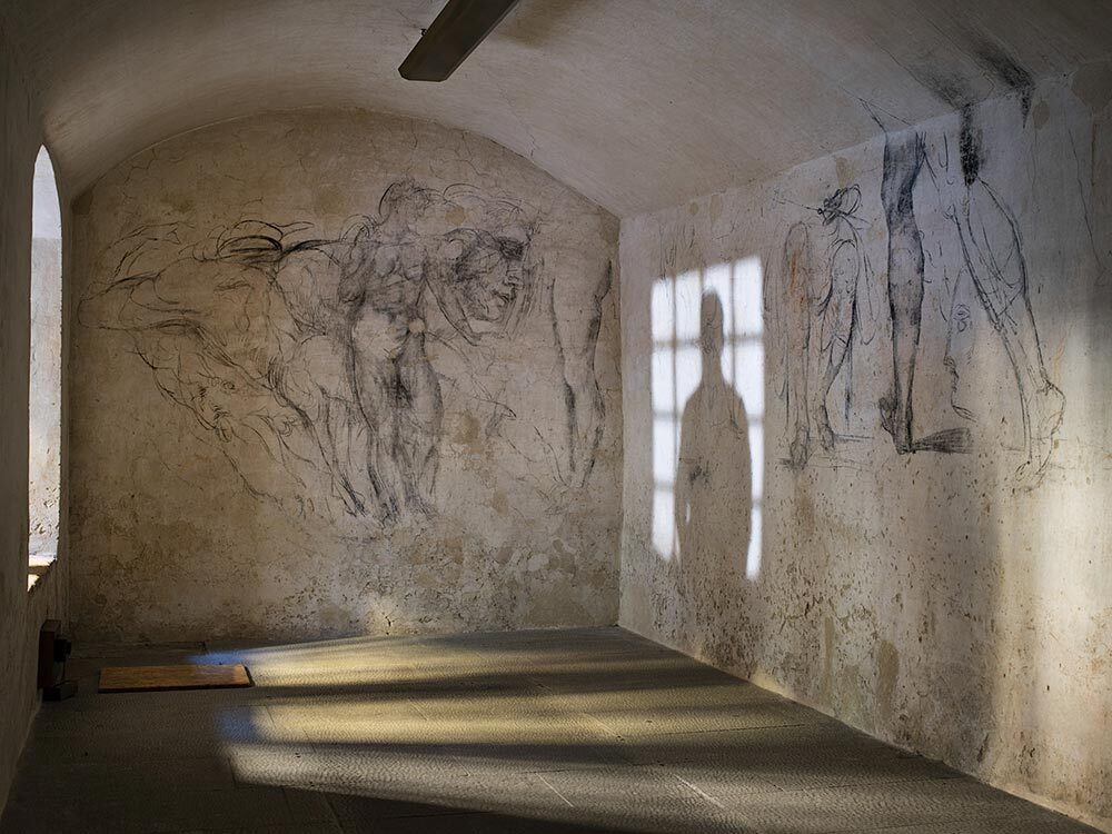 Charcoal drawings believed to be by Michelangelo on a cellar wall beneath the Medici Chapel in Florence, Italy.