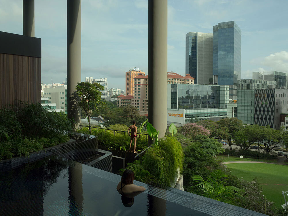 greenery cascades off a luxury hotel