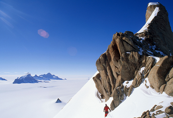 A climber treks on Trollslottet Mountain in Antarctica's Queen Maud Land.