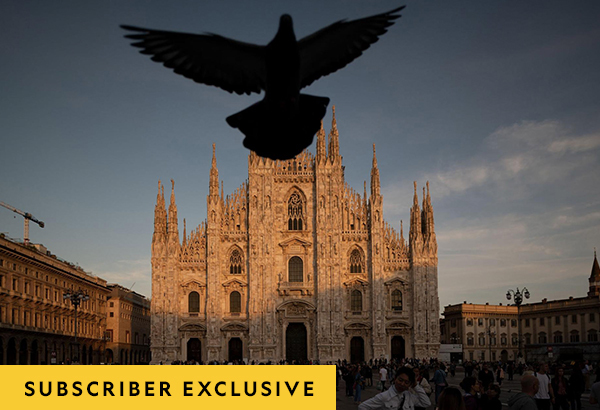 A pigeon takes flight in front of Milan’s Duomo. The city’s wealth made it a hub for medieval and Renaissance artists and architects.