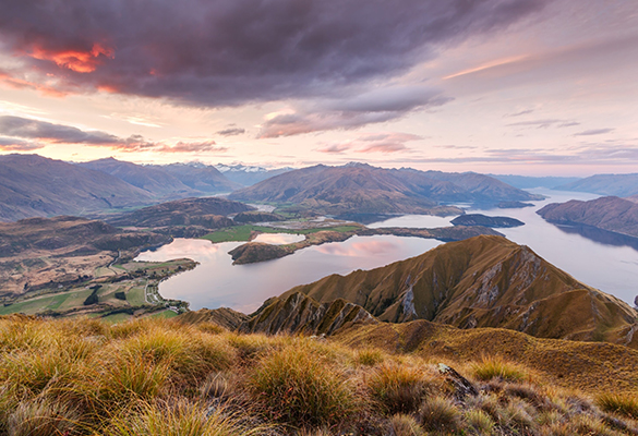 Roys Peak, with its view over Lake Wanaka, is a restful spot for hikers to catch the sunset after a day of activity.
