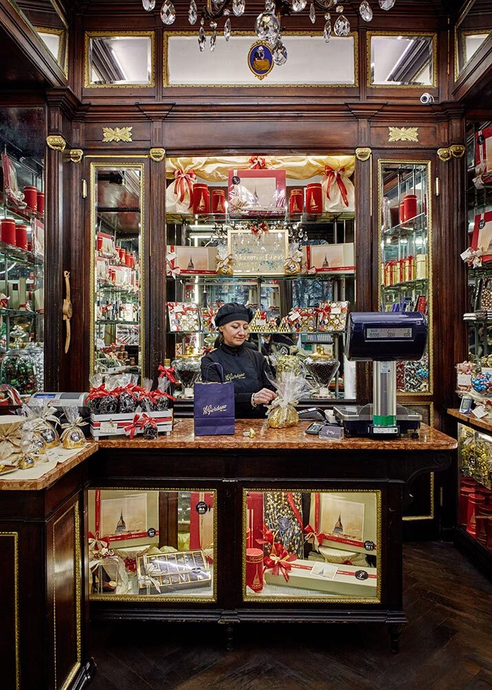 At A. Giordano, on Piazza Carlo Felice, chocolates are delicately wrapped, ready to be taken home.