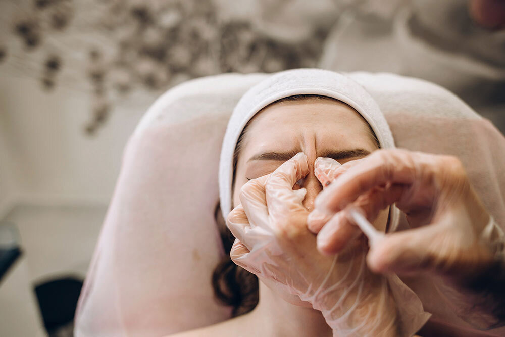 a woman receives a Botox injection