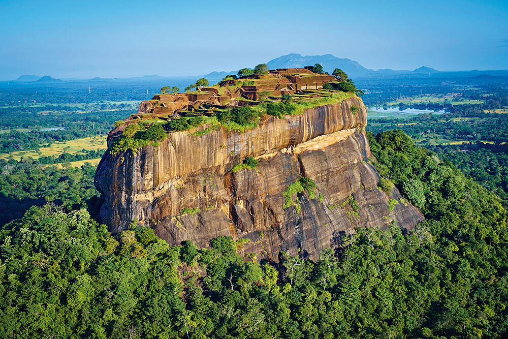 Jungle swathes the eastern face of the Sigiriya rock, topped with the citadel built by King Kashyapa I in the late fifth century A.D. in central Sri Lanka