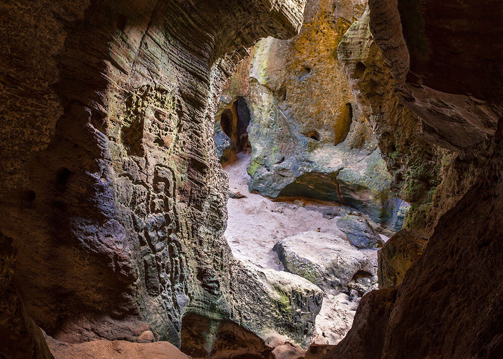 A pictures of carvings into stone walls