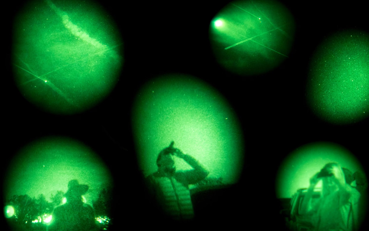 UFO believers look for suspicious spacecraft during a UFO and Vortex Tour in Sedona, Arizona. This composite image is a combination of six photographs taken in 2017 through night vision goggles.