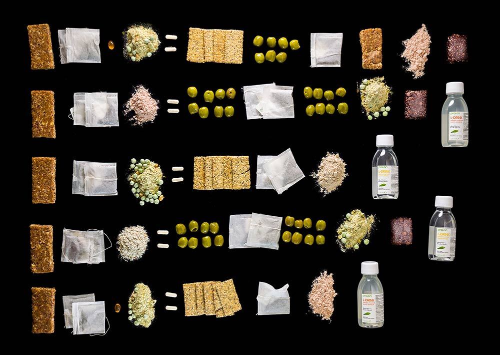 An example of a five-day diet mimicking a fast with different food items on a black background.