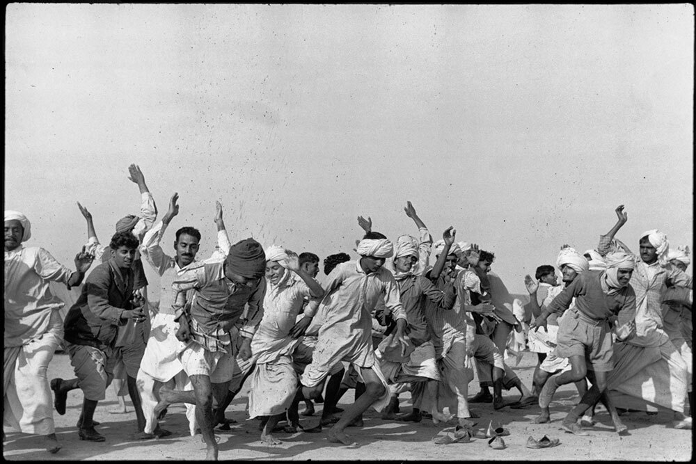 People exercise in an Indian refugee camp in Kurukshetra