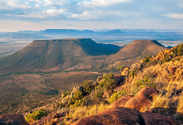 Hike the stunning vistas of Camdeboo National Park to see how millions of years of geology have shaped the landscape—including the Valley of Desolation.