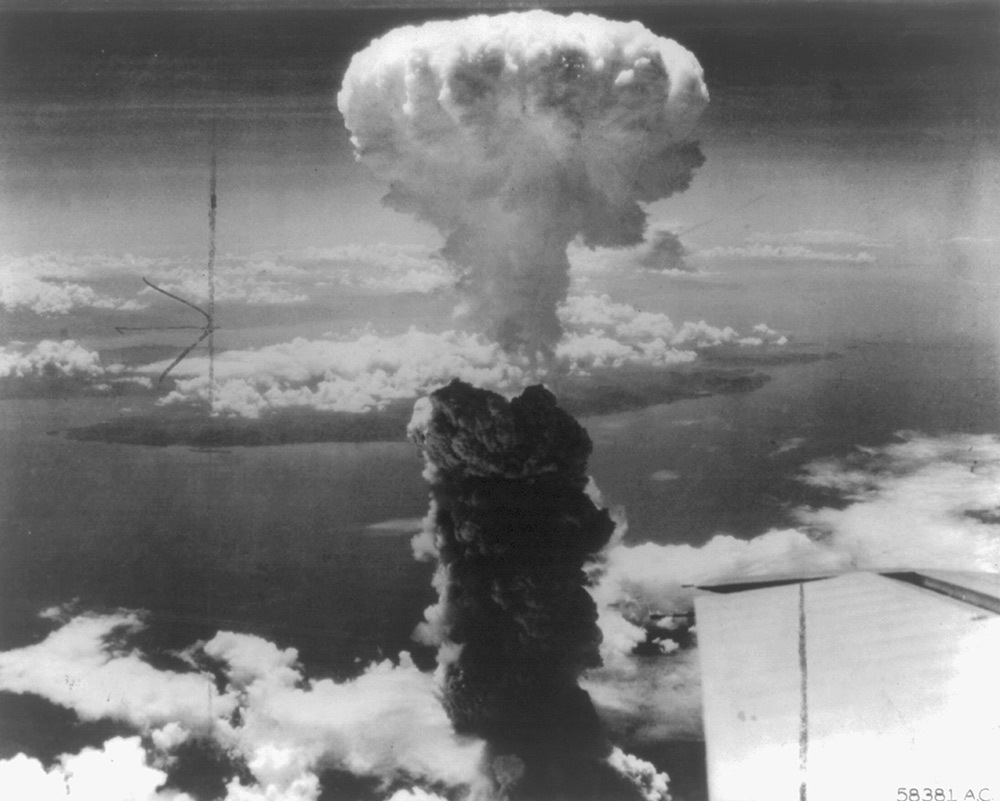 A mushroom cloud towers over Nagasaki after the detonation of an atomic bomb in 1945.