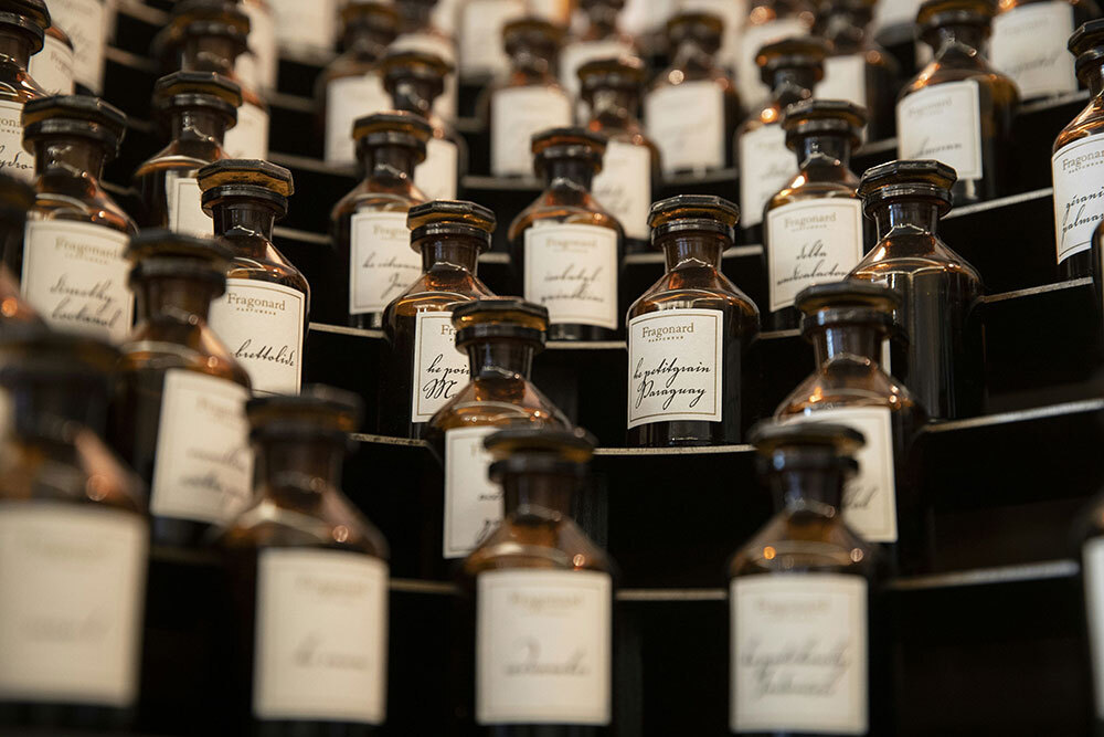 A picture of many bottles of perfume