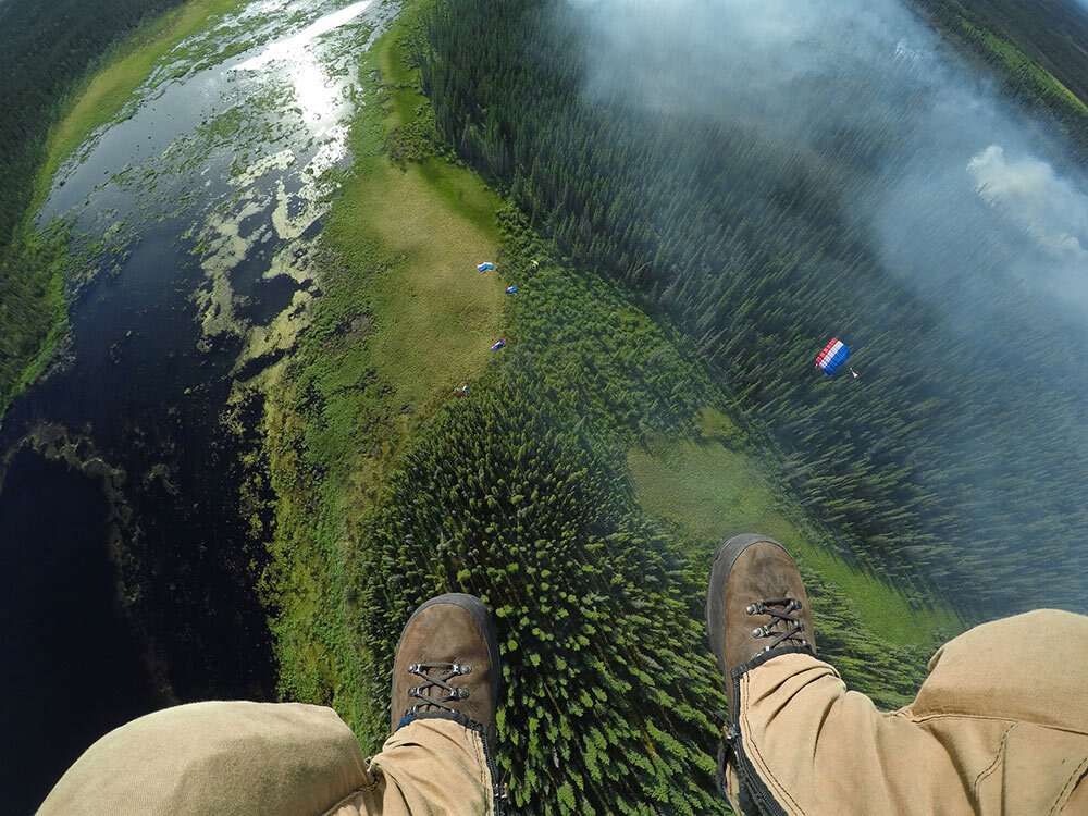 a smokejumper parachutes into Alaska backcountry