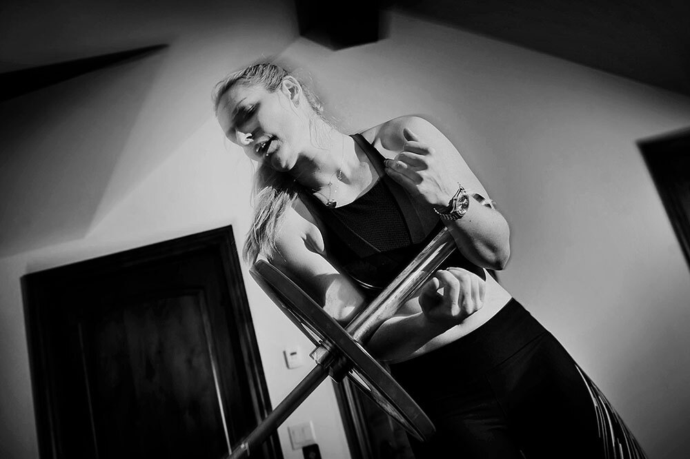 Olympic skier, Lindsey Vonn, the most decorated World Cup American ski racer, exercising in her home gym in Vail, Colorado.